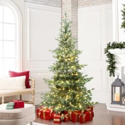 LuxenHome 7Ft Pre-Lit Artificial Pine Christmas Tree With Dusty Green PE Tips & Metal Stand -Garden GUEST 0d49c1cb 5791 4c81 bf10 d5facb53de89