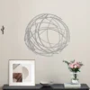 LuxenHome Silver Metal Abstract Swirl Round Wall Art Decor -Garden GUEST 10fc6300 a92b 4ac5 9d70 1c1279173bf6