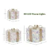 LuxenHome 3-Piece Prism Gift Boxes With Gold Ribbon Holiday Decoration With Lights Multicolored, Gold, White -Garden GUEST 657583e1 d41f 48d8 88e3 c2771fa7a53d