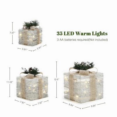 LuxenHome 3-Pc Lighted Silver Tinsel Gift Box Set With Champagne Ribbon, Outdoor Holiday Decoration Silver, Champagne, Green 3 LuxenHome 3-Pc Lighted Silver Tinsel Gift Box Set With Champagne Ribbon, Outdoor Holiday Decoration Silver, Champagne, Green