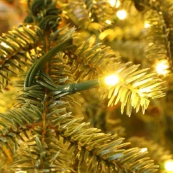 LuxenHome 5.5Ft Pre-Lit Artificial Fir Christmas Tree, Realistic Green Branches & Decorative Planter -Garden GUEST 9068596e 35ef 45d9 b3f9 9c57a453e48a