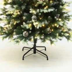 LuxenHome 6Ft Pre-Lit Green Branches With Green And White Tips Artificial Christmas Tree With Stand -Garden GUEST 9fcf2a33 1191 42d9 a379 4f07877b0d1d