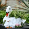 LuxenHome White Resin Swan Family Planter -Garden GUEST c74df8d0 229c 41fb 927c 852b4590bd75