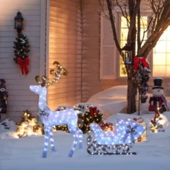 LuxenHome 2-Piece White Reindeer And Sleigh With Silver Bow And Ornaments Outdoor Holiday Decoration With Lights White, Multi, Silver, Brown -Garden GUEST d2772003 aee7 474a aa62 e9ee86a5a332