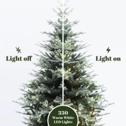 LuxenHome 7Ft Pre-Lit Green Artificial Fir Christmas Tree With Mistletoe Decorations And Metal Stand -Garden GUEST defb2c74 af0b 4c29 9dad ec35a800fd83