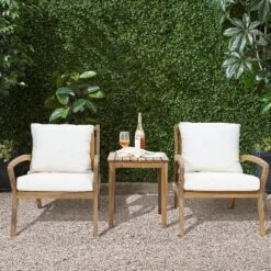 LuxenHome Outdoor Acacia Wood Side Table And Set Of 2 Armchairs With White Cushions
